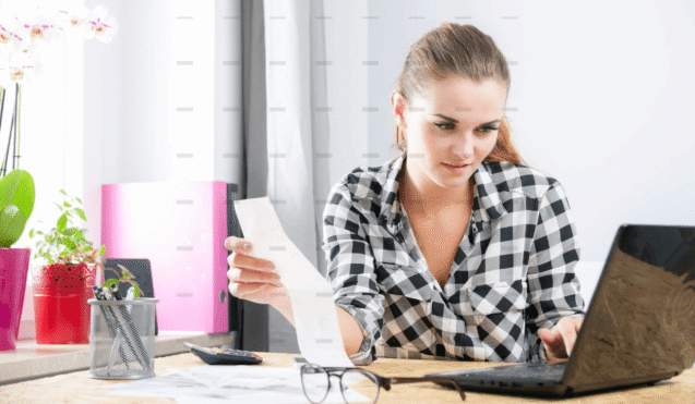 demo-attachment-2817-Smiling-young-woman-calculabting-and-paying-bills-in-home-office-4-39051-original-protected-scaled